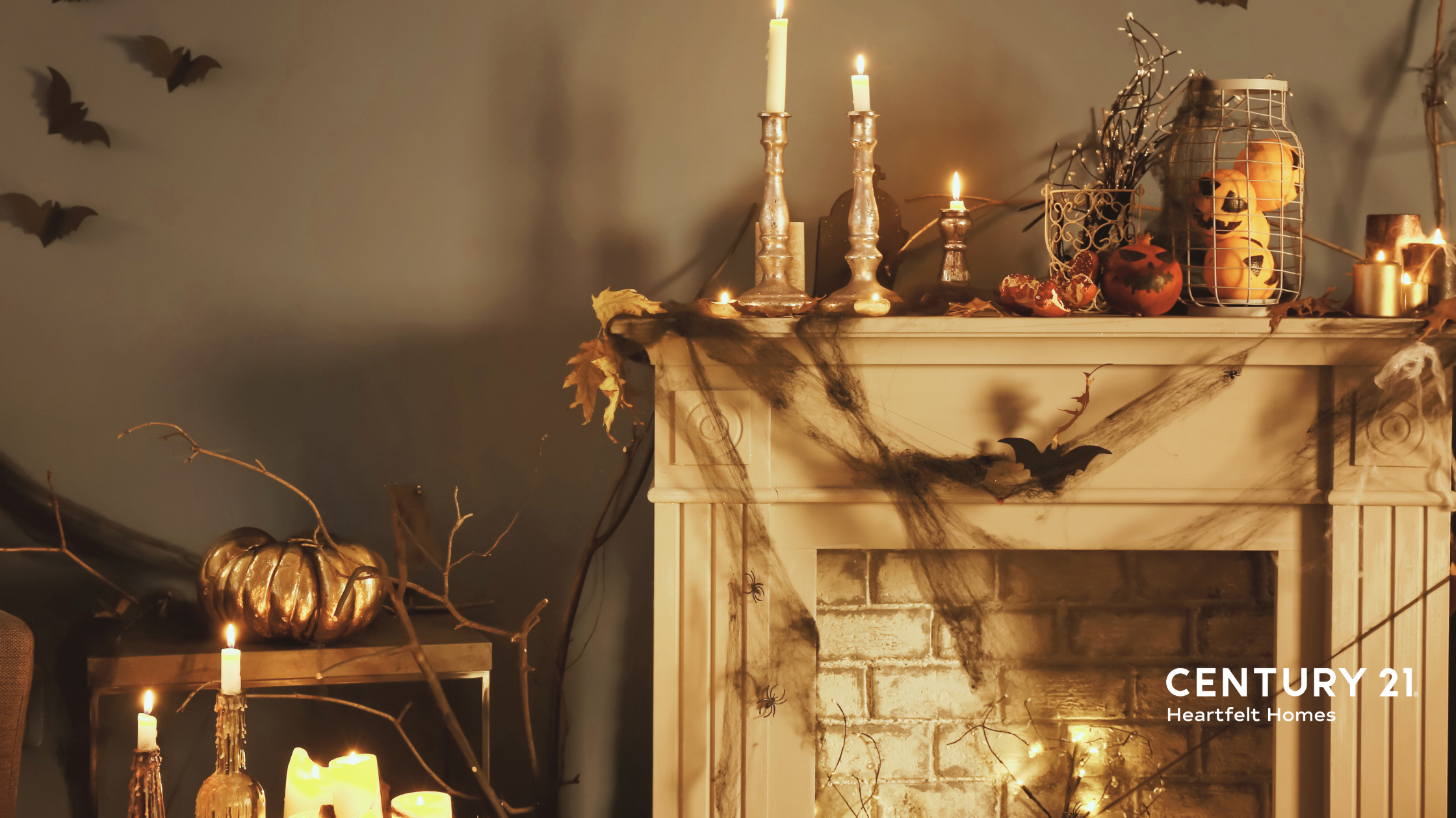 white wood hearth and fireplace with spooky halloween decor